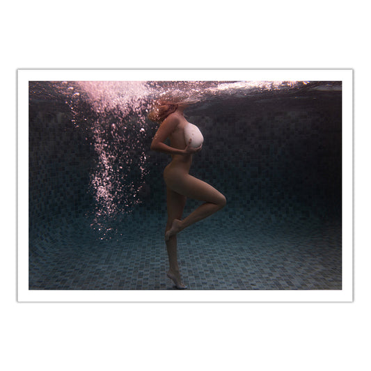A person stands on one leg underwater in a tiled pool, arm across their chest, with air bubbles rising over their face and soft reflections—captured in Francesca Owen’s Shell & She #1 fine art print with certificate of authenticity.